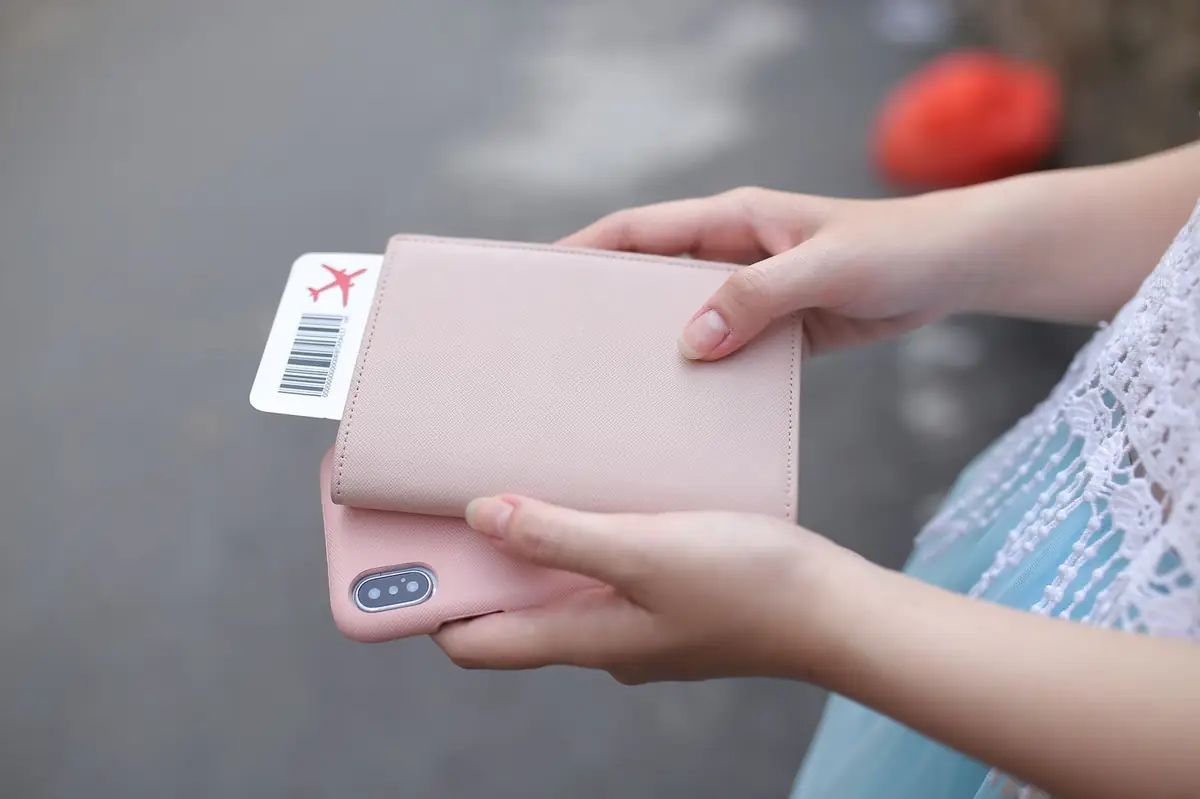 Phone with boarding pass and passport for Malaysia travel